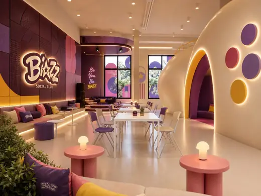Biazz: club interior with rounded walls and a lit wordmark