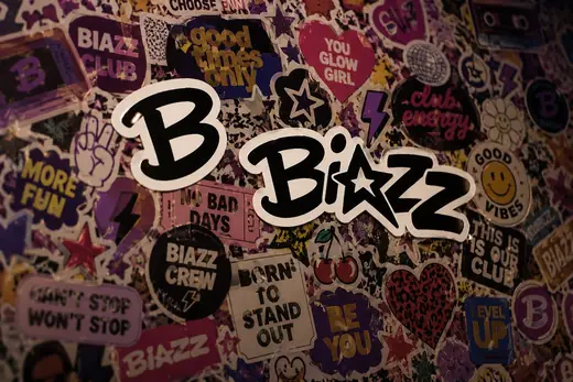Biazz: the B mark and wordmark among a wall of club stickers