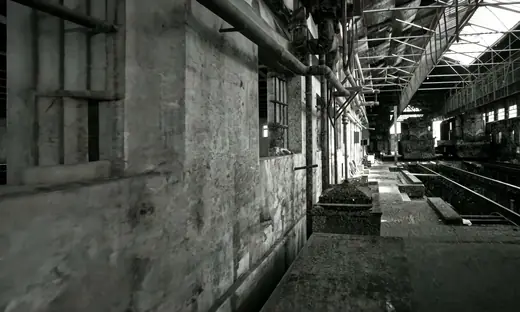 Marshaling Yard: The empty engine hall with its tracks