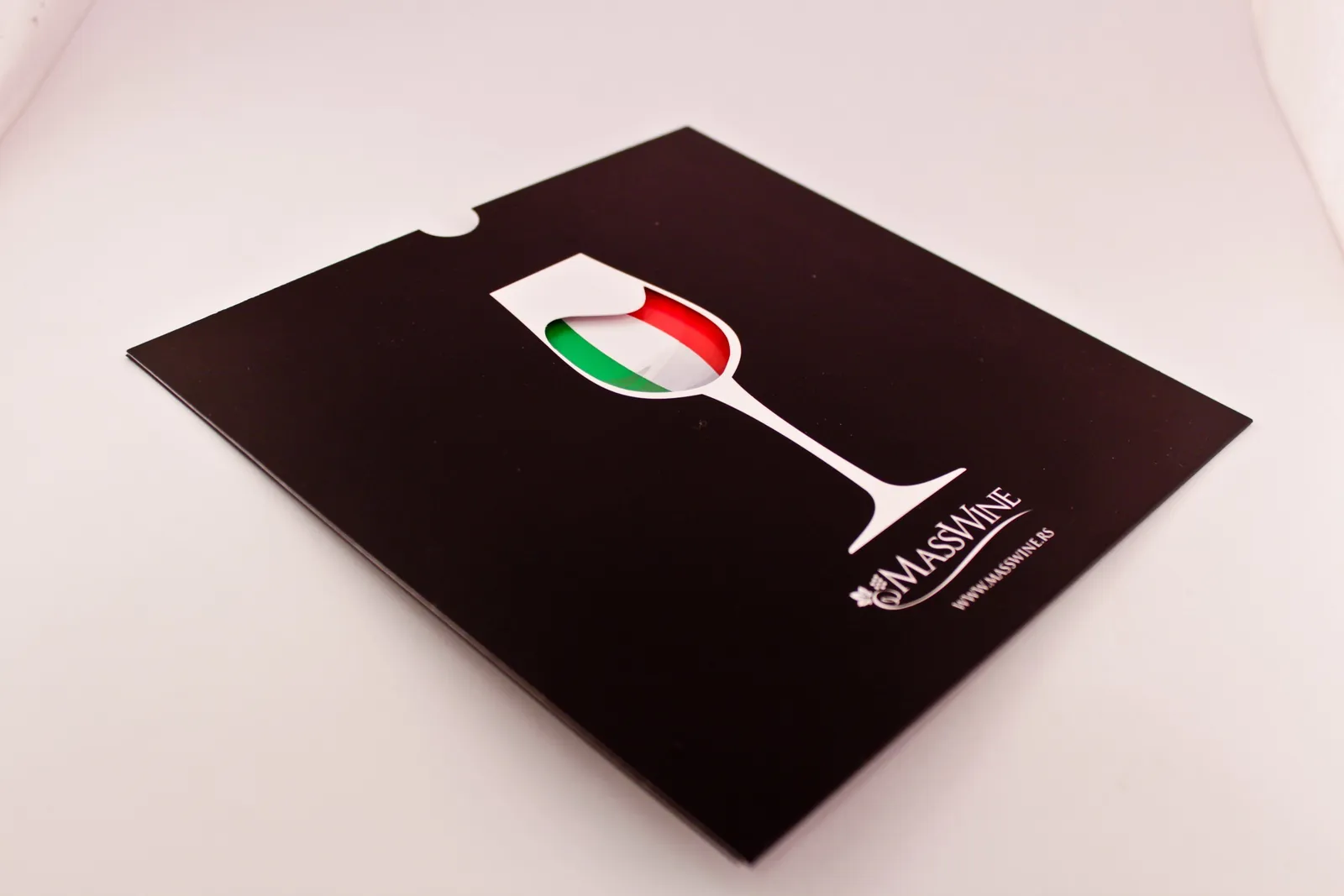 MassWine: black MassWine folder with a wine glass cut out to show green, white and red