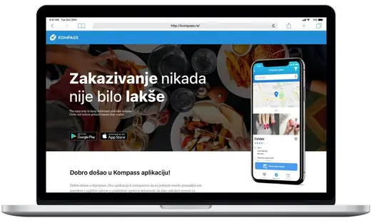 Kompass landing page on a laptop with the app on a phone