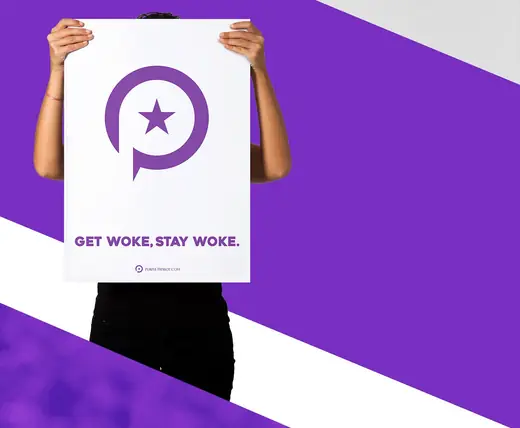 Person holding a Purple Patriot poster reading Get woke, stay woke