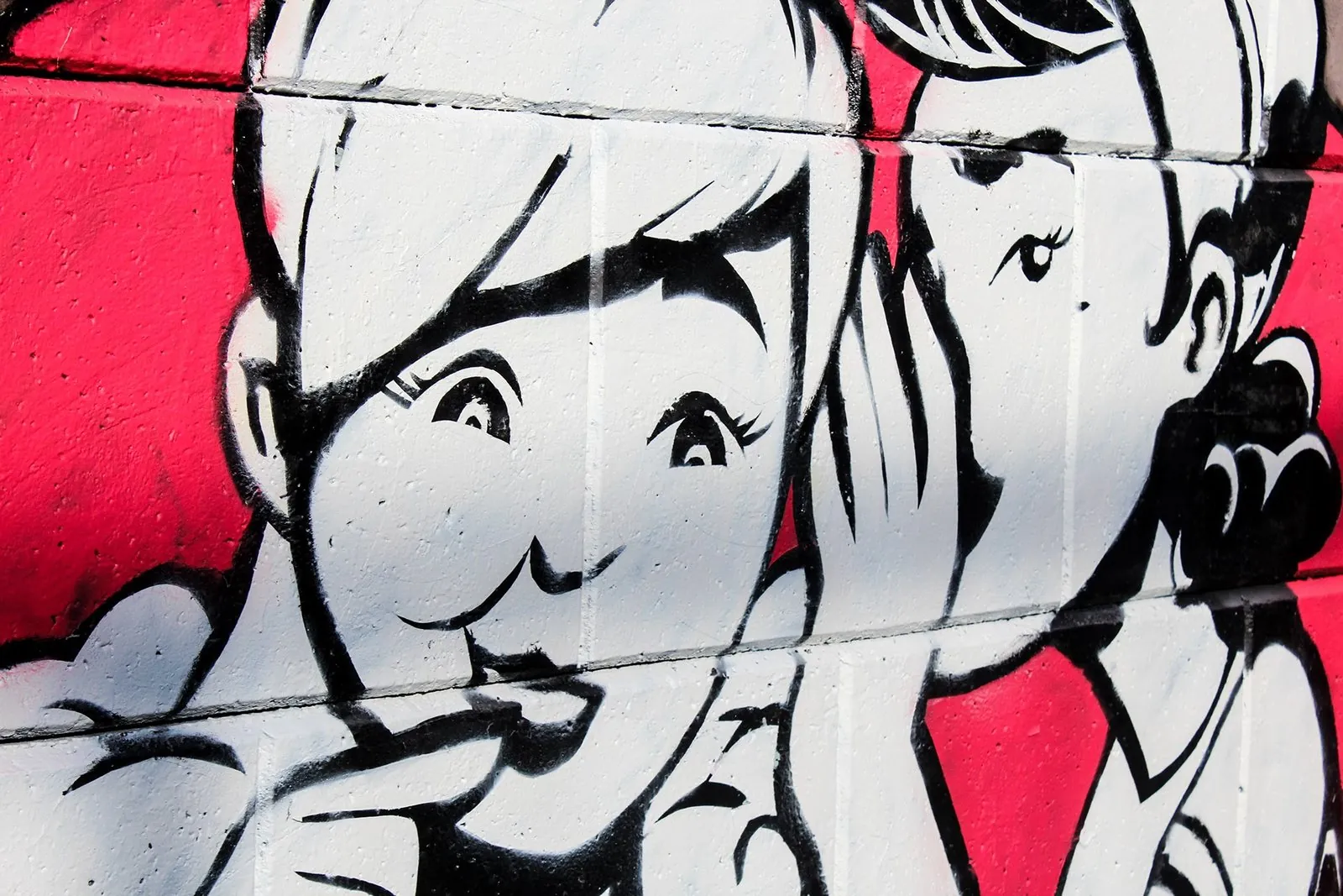 mural showing two girls gossiping