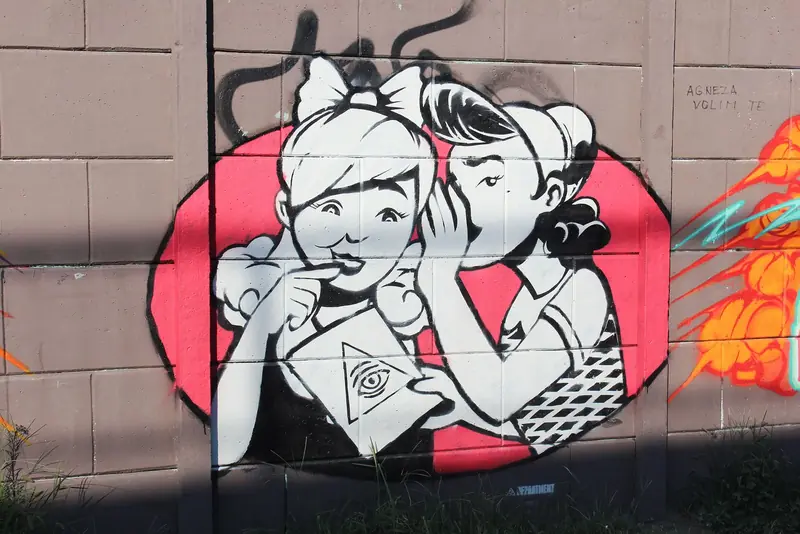 two girls gossiping mural