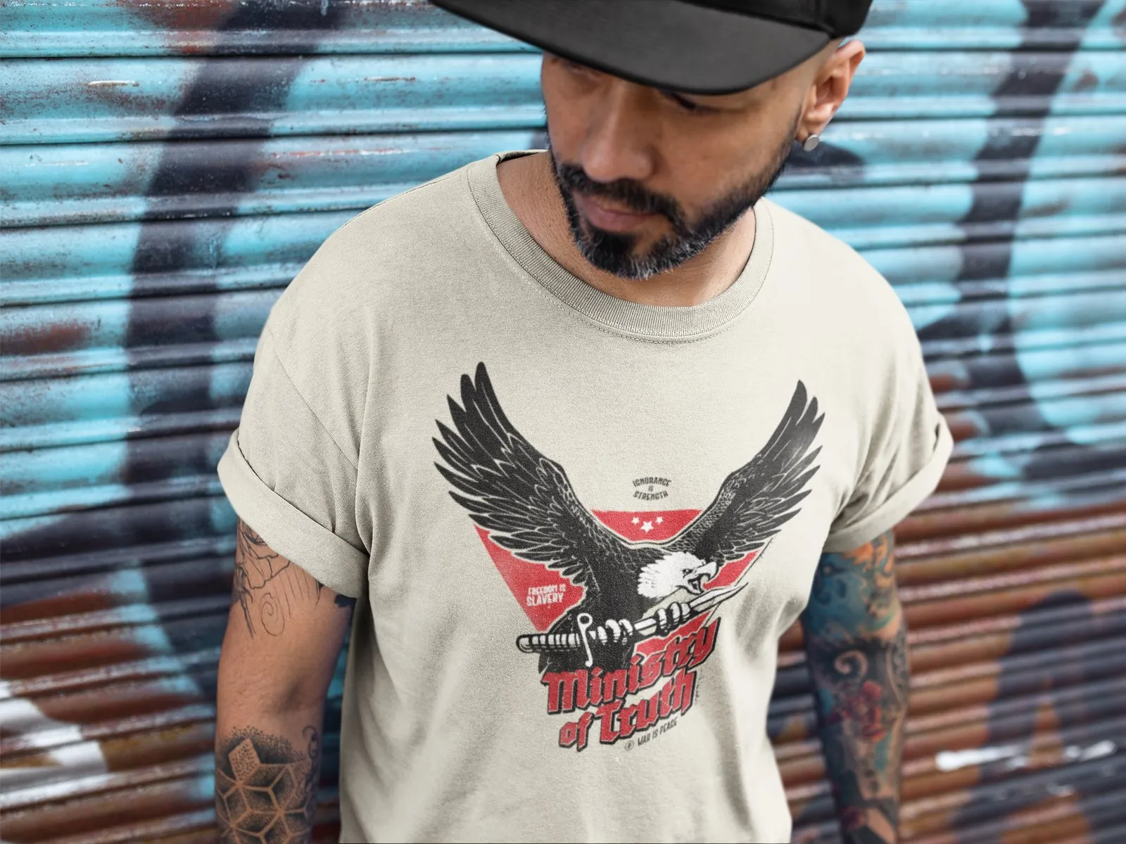 man wearing a t-shirt with eagle logo on it