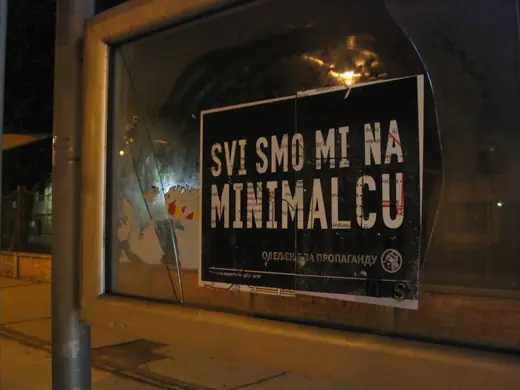 Propaganda Department: Svi smo mi na minimalcu poster in a bus shelter at night