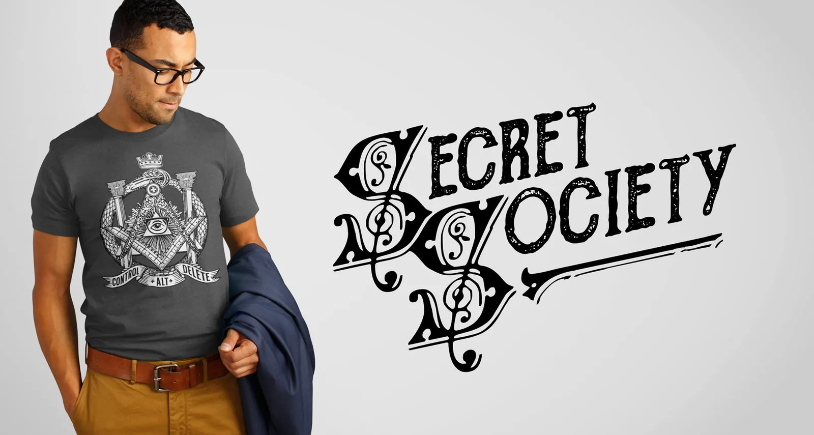 man wearing a shirt with a freemasonry symbol, overseeing eye with glasses