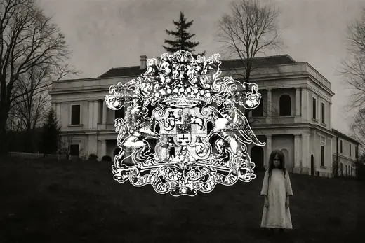 The Marczibányi-Karátsonyi Castle: The family coat of arms over the castle, a girl standing on the lawn