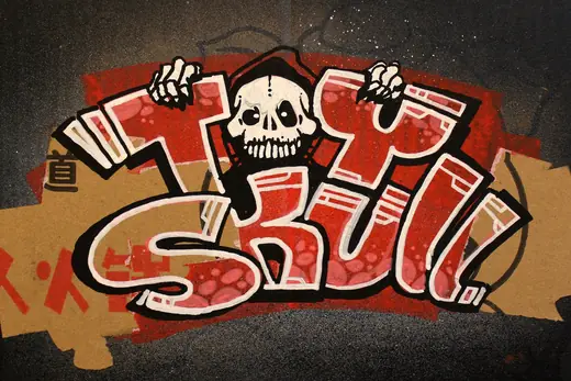 ToySkull: ToySkull lettering painted as graffiti on a wall